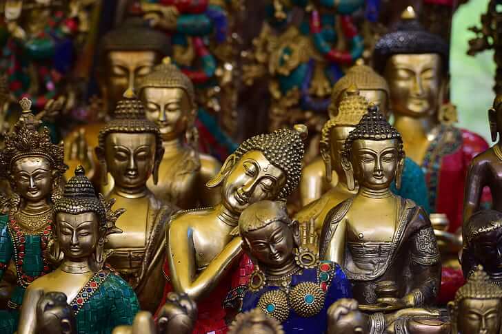 yellow-metal-buddha-idol